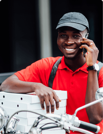 BizTies team member in yellow jacket and blue cap